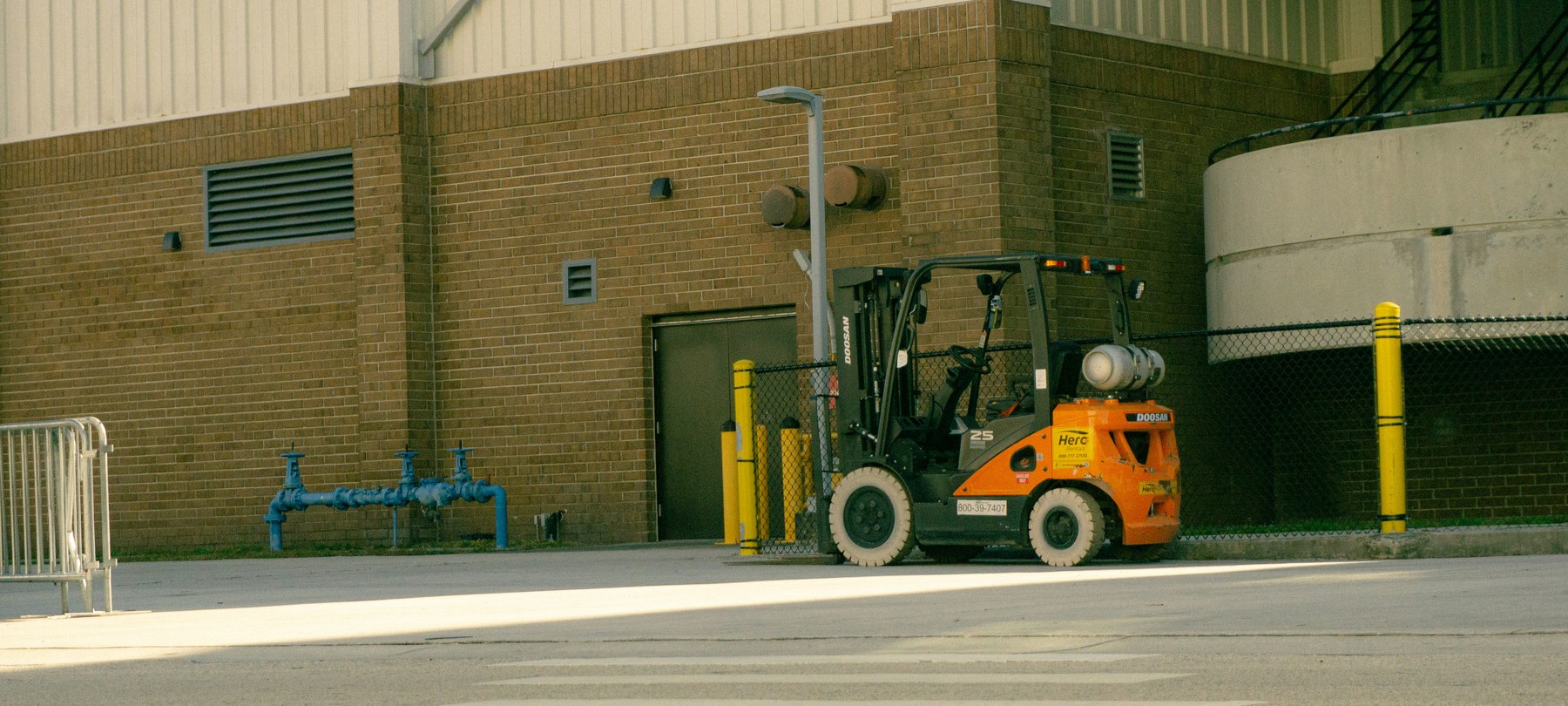 Forklift parked outside an industrial unit