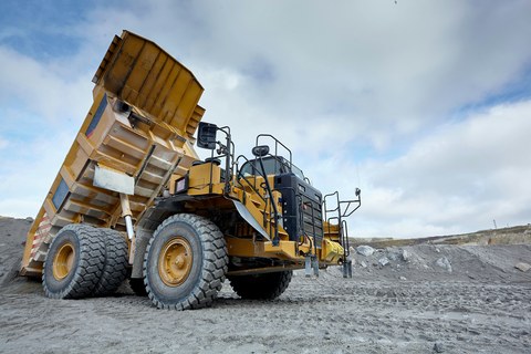 Quarry dump truck with its bed raised