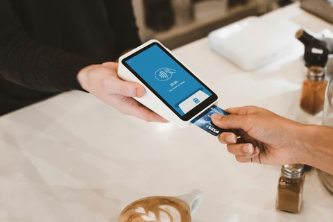 Card payment being taken on a counter terminal