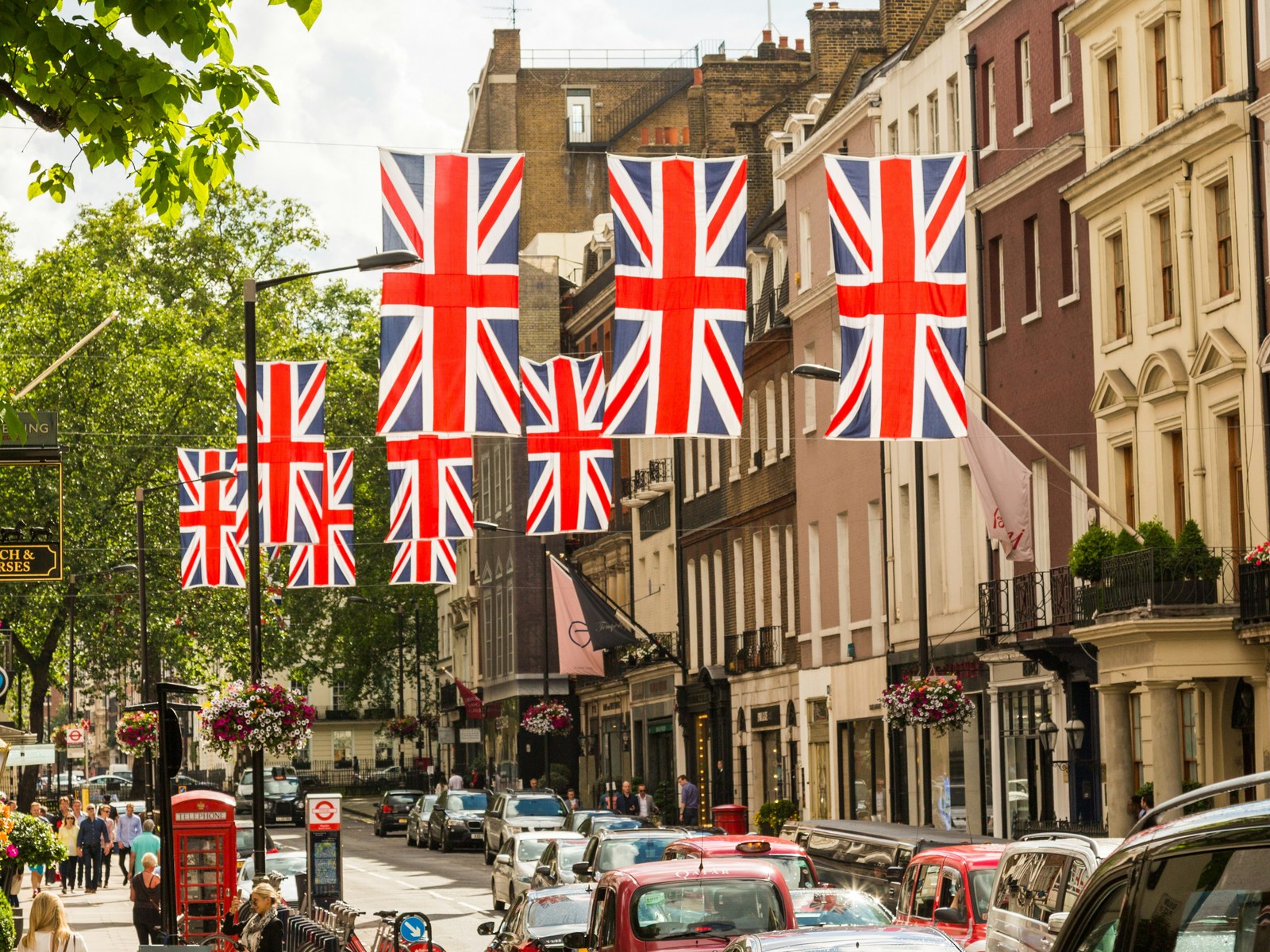 Union flags over a London street lined with shops